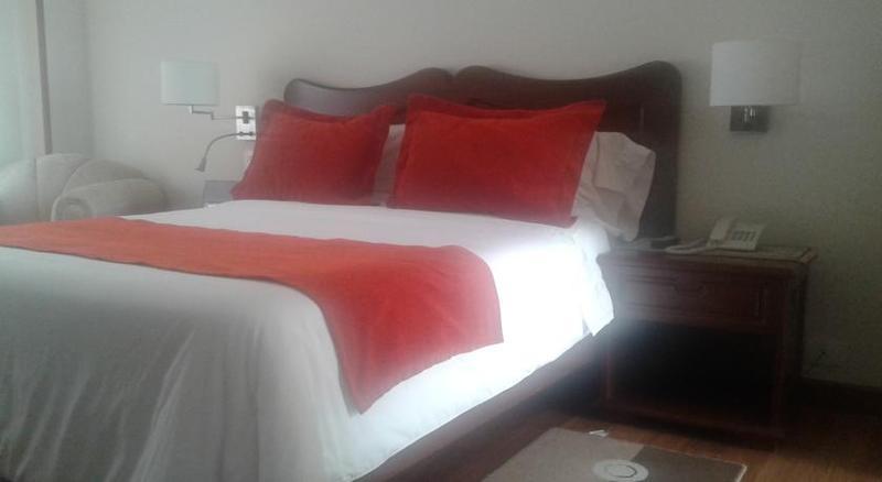 Hotel Santa Lucia Boutique Spa Bogotá Exteriér fotografie A bed with a duvet cover